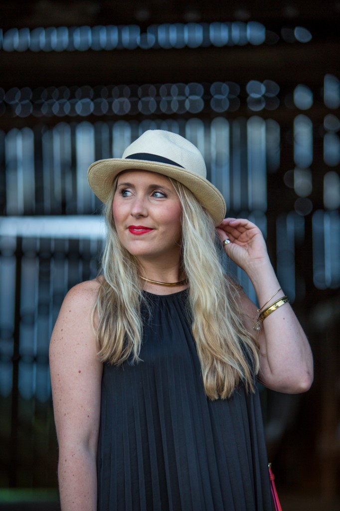 Gold choker & high neck black dress