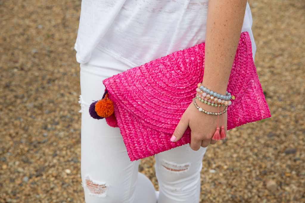 Pink pom clutch & layered bracelets