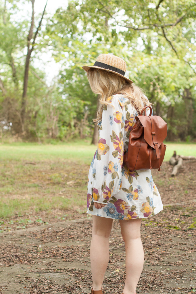 free people flirty floral dress and brown leather backpack