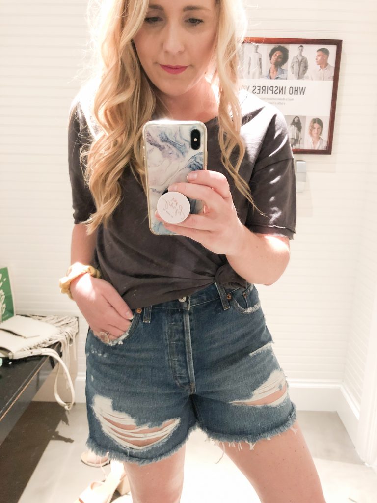 The Best of Denim Shorts for Thick Thighs featured by top Nashville fashion blogger, Pearls and Twirls: image of a woman wearing Abercrombie and Fitch high rise shorts