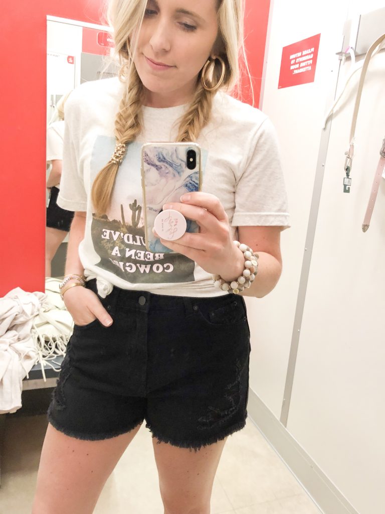 The Best of Denim Shorts for Thick Thighs featured by top Nashville fashion blogger, Pearls and Twirls: image of a woman wearing Target wild fable black denim shorts.